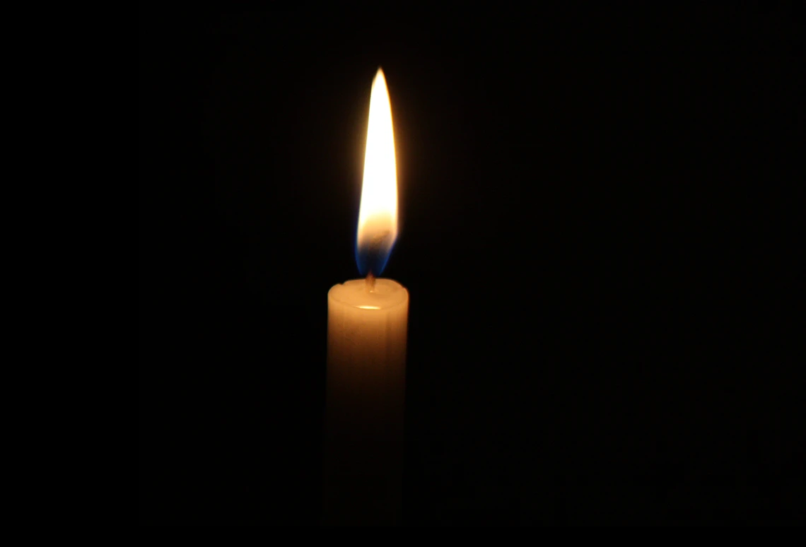 A single lit candle.