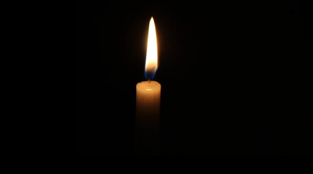 A single lit candle.